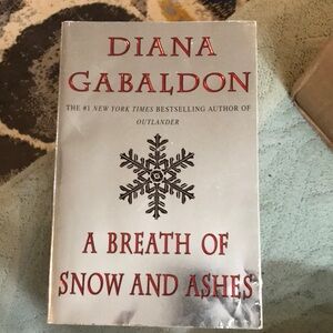 A Breath of Snow and Ashes Book
